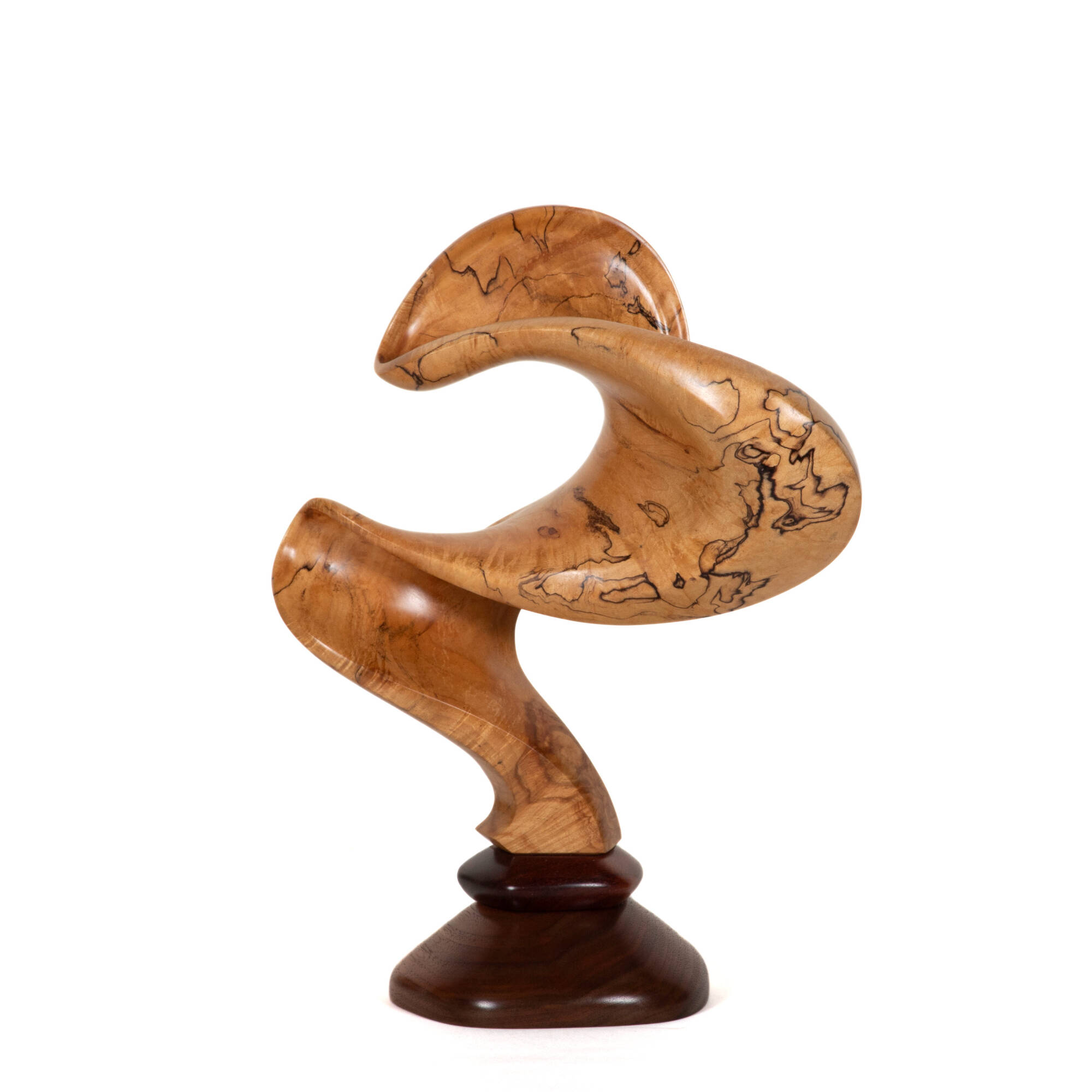 Carved curved wooden sculpture.